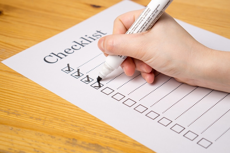 an image of a checklist used to write down three self storage packing tips