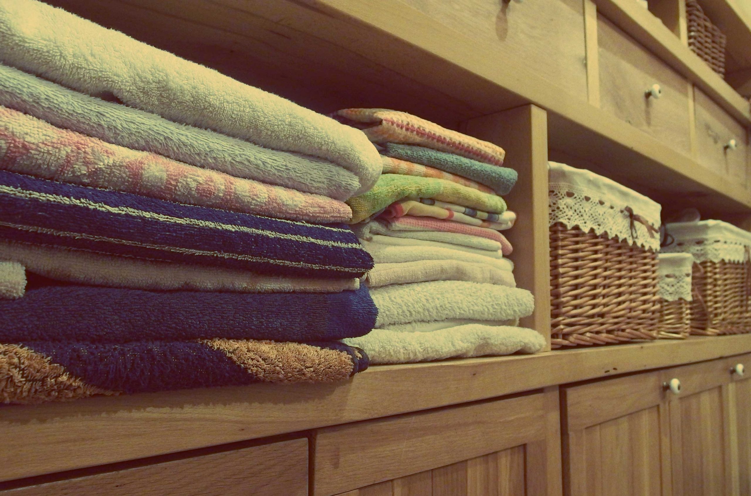 image of bathroom towels organised neatly