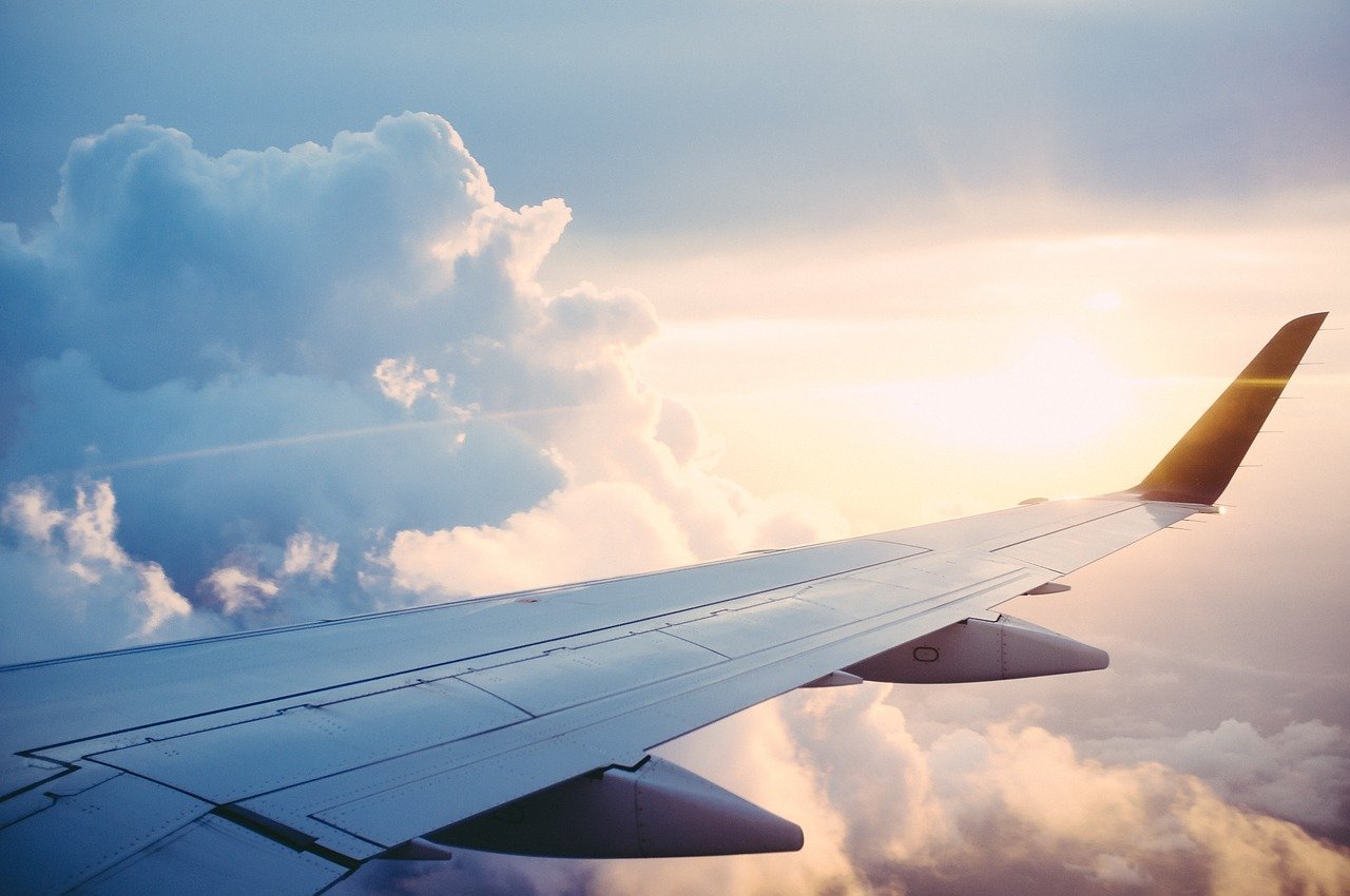image of the wing of a plane in flight